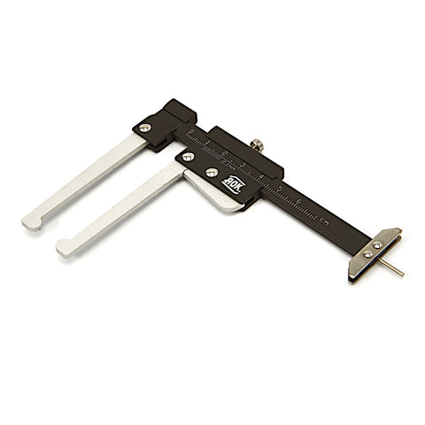 Zariadenie na meranie hrúbky brzdového kotúča a hĺbky dezénu pneumatiky